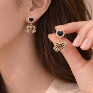 midnight bow earrings